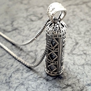 گردنبند و لوله نقره حرز امام جواد